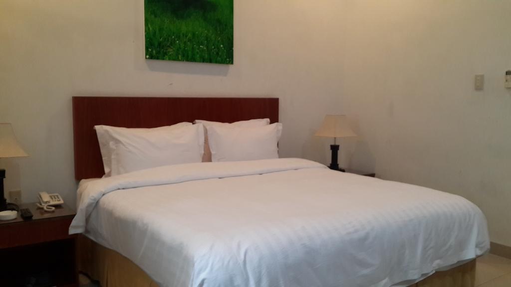 Kailani Inn Medan Room photo