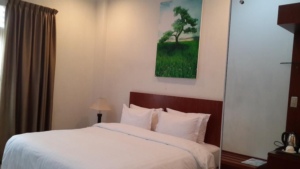 Kailani Inn Medan Room photo